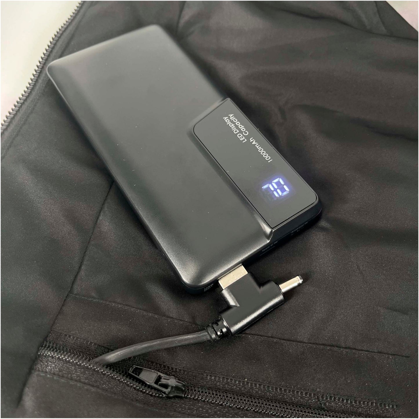 SCX.design G01 uppvärmd väst med powerbank
